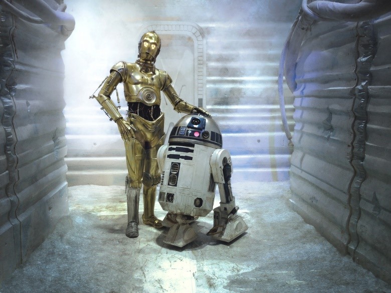 R2-D2 style droid as a companion with C3PO